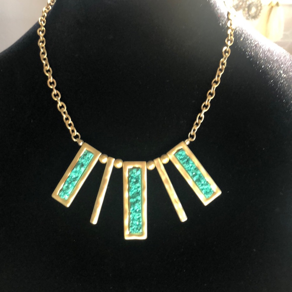 Gold tone & turquoise colored necklace